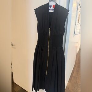 Anthropologie Black Midi Dress with Gold Zip pockets like new
